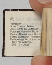 Load image into Gallery viewer, Kleinste Kochbuch der Welt. [Bolzano] Bozen. 1985. Smallest cookbook in the world. What do people eat and drink in Tyrol? 50 recipes for Tyrolean dishes. 2nd edition. 1985.
