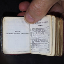 Load image into Gallery viewer, Book of Common Prayer and Administration of the Holy Communion According to the Use of the Church of England. Oxford University Press Warehouse, Amen Corner. Henry Frowde. London. 1898. Silver plaque.
