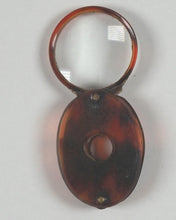 Load image into Gallery viewer, Miniature magnifying glass. [no maker, no date, no place of manufacture, circa 1910].
