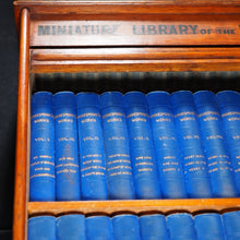 Load image into Gallery viewer, Miniature Library of The Poets. [in Oak Case with rolling tambour front shutter] Works of Shakespeare, and Poems of Burns, Byron, Longfellow, Milton, Scott, Sheridan &amp; Goldsmith. Kent &amp; Co., W. Paternoster Row, London. 1884-90
