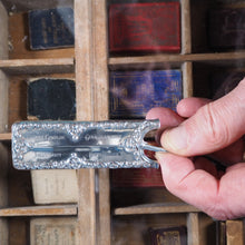 Load image into Gallery viewer, De La Rue's Improved Condensed diary and engagement book. >>FINGER SHAPED MINIATURE BOOK IN LAVISH SILVER SLIPCASE<< Publication Date: 1905 CONDITION: VERY GOOD
